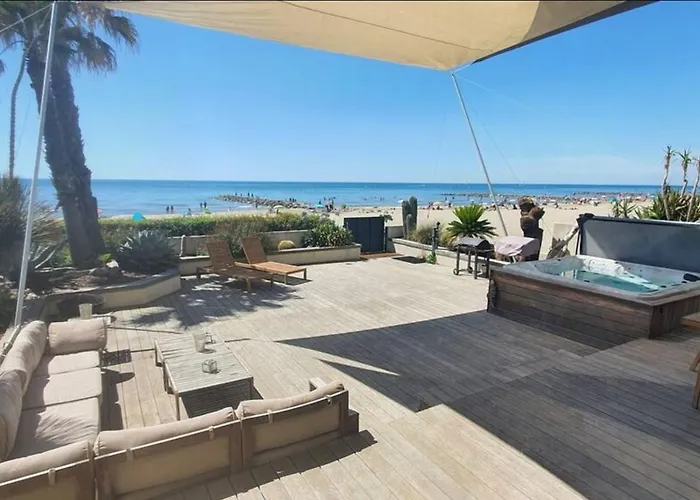 Magnifique maison posée sur le sable face à la mer