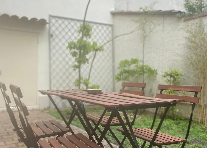 OASIS URBAINE maison de plain pied avec terrasse et jardin