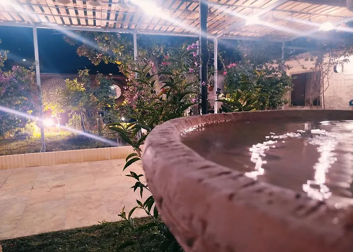 Maison rez de chaussée avec un espace jardin, bien située
